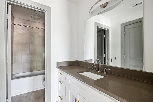 18715 Big Cypress Dr, Spring, TX 77388 - bathroom with vanity, toilet, and shower / bathtub combination