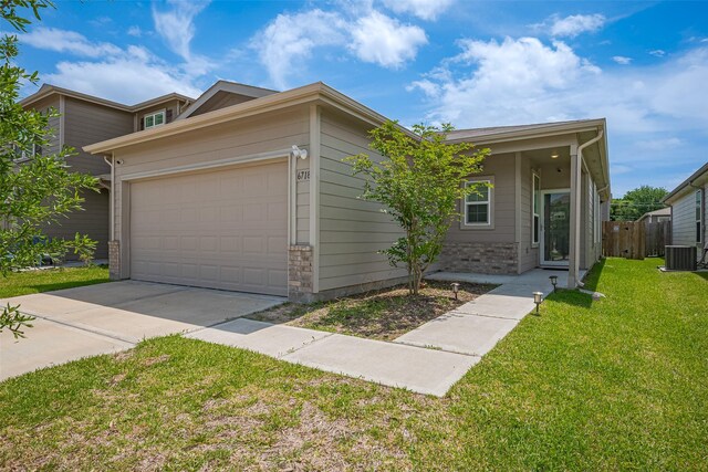 6718 Forbes Run Dr, Houston, TX 77075 - view of front of property with central AC, concrete driveway, and an attached garage