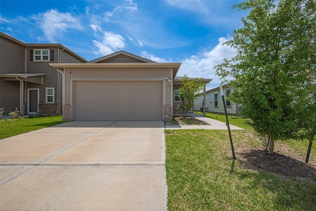 6718 Forbes Run Dr, Houston, TX 77075 - view of front of home featuring concrete driveway, a front lawn, an attached garage, and brick siding