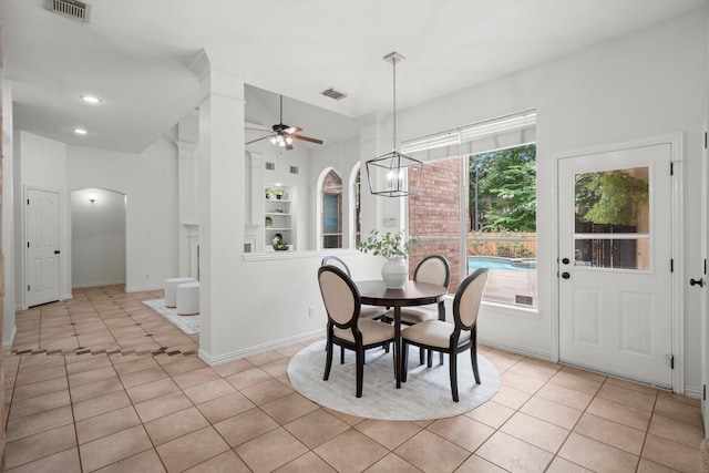 35 Dewdrift Pl, The Woodlands, TX 77382 - dining room with arched walkways, a ceiling fan, light tile patterned floors, baseboards, and recessed lighting