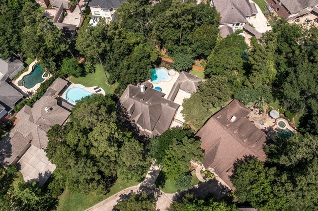 35 Dewdrift Pl, The Woodlands, TX 77382 - aerial view of property and surrounding area with a pool area