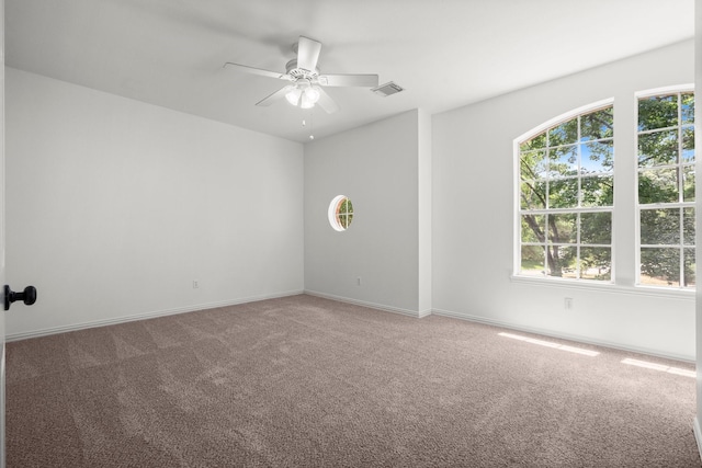 35 Dewdrift Pl, The Woodlands, TX 77382 - carpeted empty room with ceiling fan and baseboards