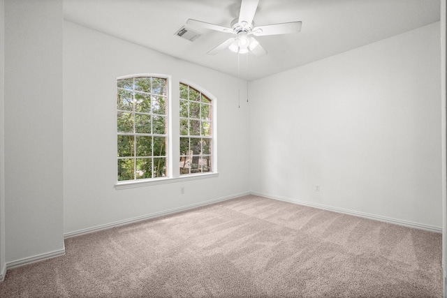 35 Dewdrift Pl, The Woodlands, TX 77382 - empty room featuring carpet, baseboards, and ceiling fan