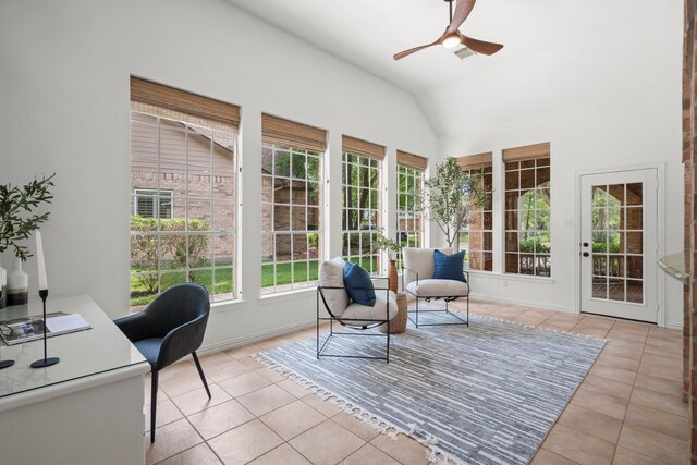 35 Dewdrift Pl, The Woodlands, TX 77382 - sunroom / solarium with tile patterned floors, plenty of natural light, vaulted ceiling, and baseboards
