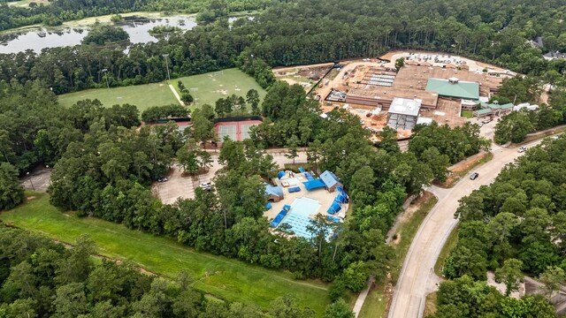 35 Dewdrift Pl, The Woodlands, TX 77382 - aerial view of property's location with a large body of water and a forest