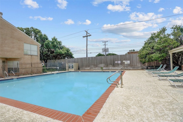 2014 Augusta Dr, Houston, TX 77057 - community pool featuring a fenced backyard and a patio