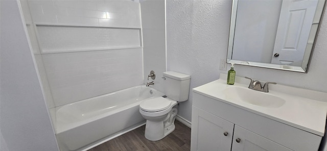110 Hidden Cir, Coldspring, TX 77331 - bathroom featuring a textured wall, vanity, wood finished floors, toilet, and shower / tub combination