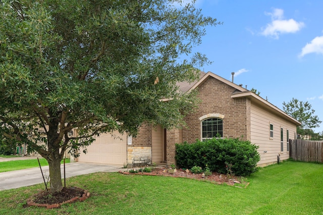 25426 Saddlebrook Champion Way, Tomball, TX 77375 - view of front of house with driveway, an attached garage, and brick siding