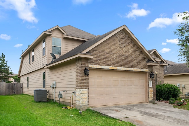 25426 Saddlebrook Champion Way, Tomball, TX 77375 - view of side of home with central AC, driveway, a garage, and brick siding