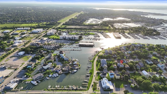 718 Pine Rd, Clear Lake Shores, TX 77565 - aerial view of property's location with numerous boat docks and a nearby body of water