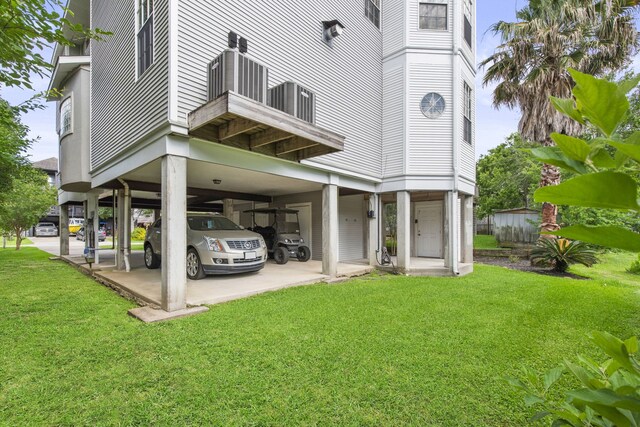 718 Pine Rd, Clear Lake Shores, TX 77565 - view of parking / parking lot featuring a carport