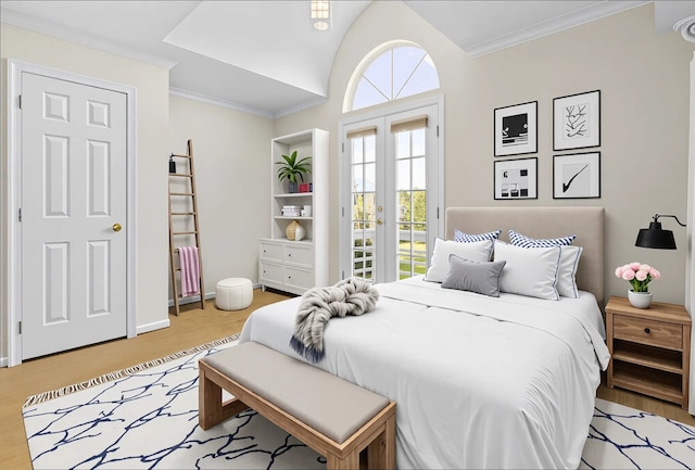 718 Pine Rd, Clear Lake Shores, TX 77565 - bedroom featuring access to outside, light wood-style floors, ornamental molding, and french doors