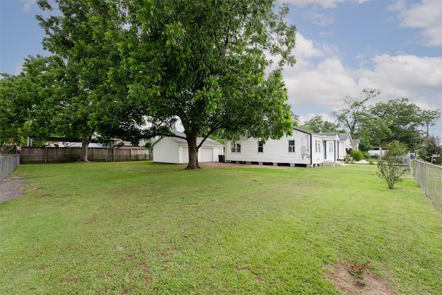 7009 Tuck St, Houston, TX 77020 - view of yard with a garage and an outdoor structure