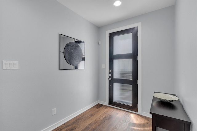 2719 Clay St, Houston, TX 77003 - doorway with dark wood-type flooring, baseboards, and recessed lighting