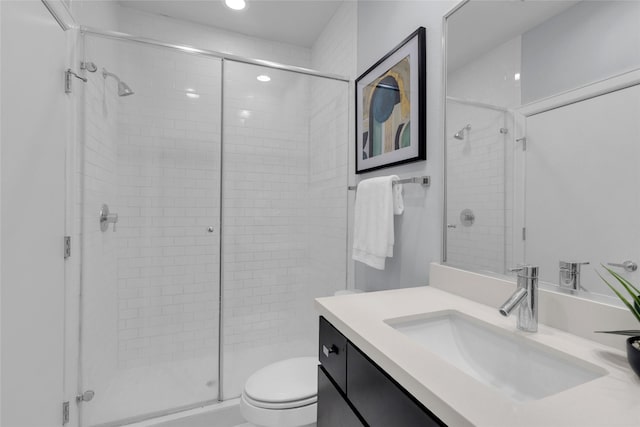2719 Clay St, Houston, TX 77003 - bathroom featuring a stall shower, vanity, toilet, and recessed lighting