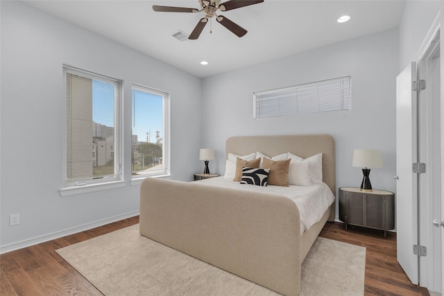 2719 Clay St, Houston, TX 77003 - bedroom featuring dark wood-type flooring, recessed lighting, a ceiling fan, and baseboards