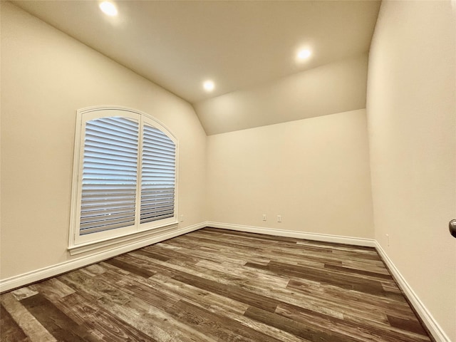 2023 Deer Vly, Missouri City, TX 77459 - empty room with lofted ceiling, dark wood-type flooring, baseboards, and recessed lighting