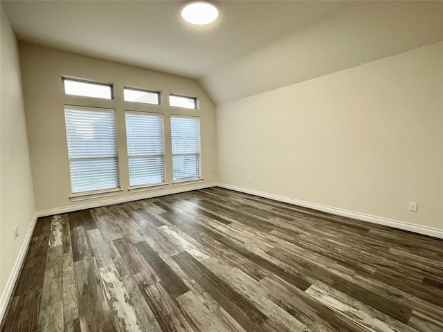 2023 Deer Vly, Missouri City, TX 77459 - unfurnished room with dark wood-style floors, baseboards, and vaulted ceiling