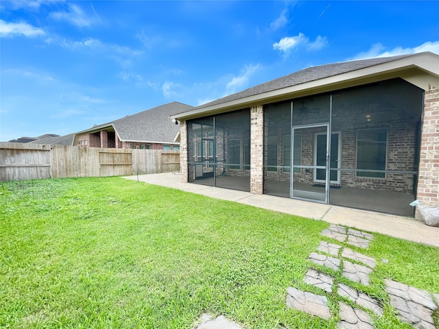 2023 Deer Vly, Missouri City, TX 77459 - view of yard featuring a sunroom and a patio area