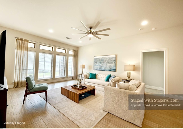 2023 Deer Vly, Missouri City, TX 77459 - living area featuring ceiling fan, recessed lighting, and baseboards