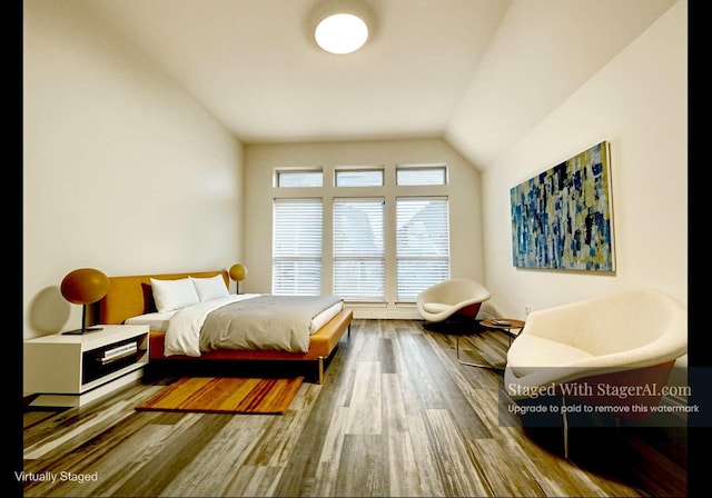 2023 Deer Vly, Missouri City, TX 77459 - bedroom with wood finished floors and vaulted ceiling