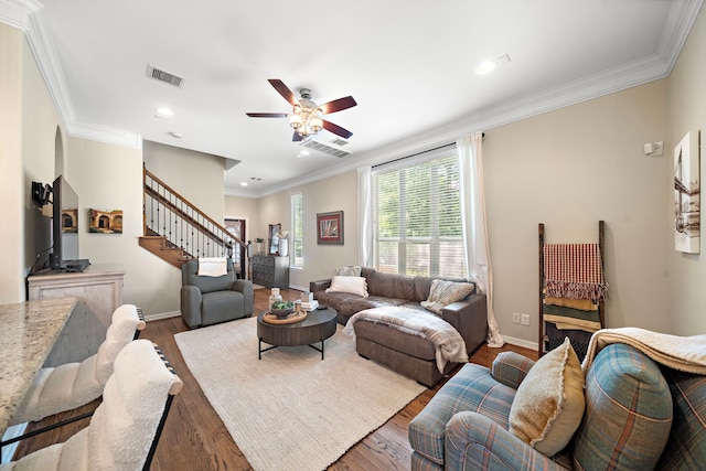 3303 New Garden View Ln, Houston, TX 77018 - living room featuring wood finished floors, a ceiling fan, stairway, ornamental molding, and baseboards
