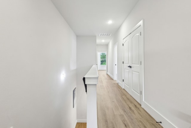 3722 Nathaniel Brown St, Houston, TX 77021 - hall featuring light wood-type flooring, baseboards, and recessed lighting
