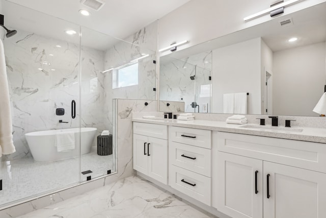 3722 Nathaniel Brown St, Houston, TX 77021 - full bathroom featuring double vanity, a marble finish shower, a soaking tub, marble finish floors, and recessed lighting
