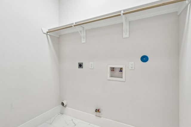 3722 Nathaniel Brown St, Houston, TX 77021 - laundry room featuring hookup for a gas dryer, baseboards, electric dryer hookup, washer hookup, and marble look tile flooring