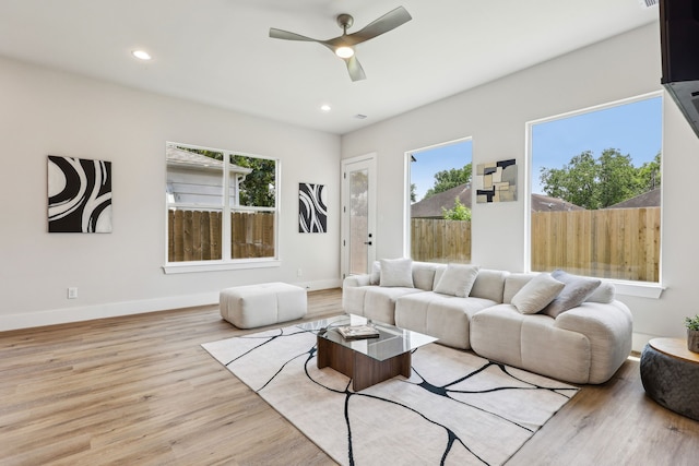 3722 Nathaniel Brown St, Houston, TX 77021 - living area featuring healthy amount of natural light, ceiling fan, wood finished floors, and recessed lighting