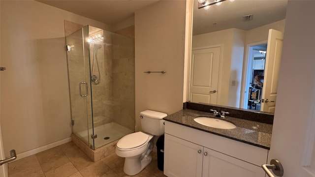 3505 Sage Rd Unit 2405, Houston, TX 77056 - bathroom featuring a stall shower, toilet, vanity, baseboards, and tile patterned flooring