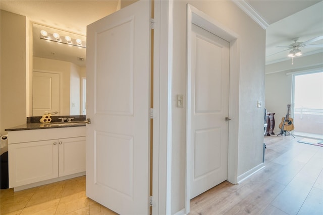 3505 Sage Rd Unit 2405, Houston, TX 77056 - hall with ornamental molding and light wood finished floors