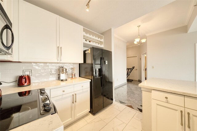 3505 Sage Rd Unit 2405, Houston, TX 77056 - kitchen featuring black appliances, light marble finish flooring, crown molding, white cabinets, and backsplash