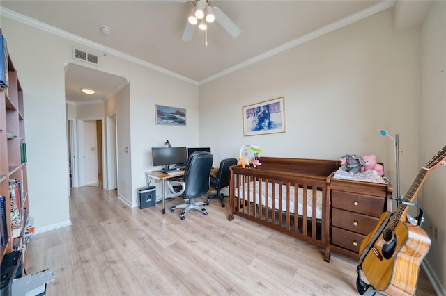 3505 Sage Rd Unit 2405, Houston, TX 77056 - office area featuring light wood finished floors, ceiling fan, and crown molding