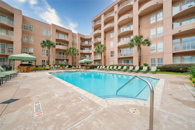 3505 Sage Rd Unit 2405, Houston, TX 77056 - community pool with a patio area