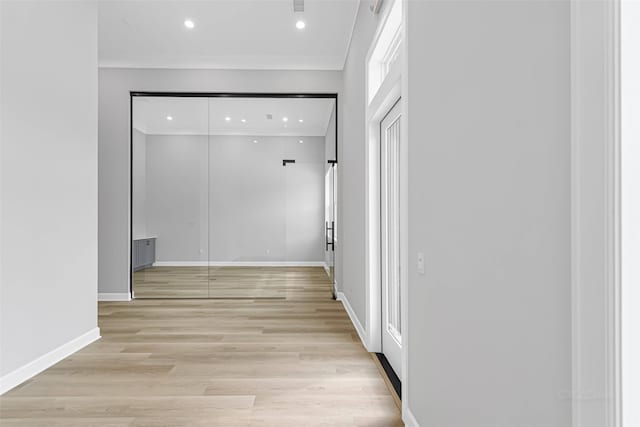 1325 Main St Unit 1103, Katy, TX 77494 - hall featuring recessed lighting, ornamental molding, light wood-style floors, and baseboards