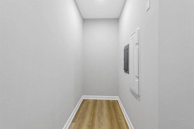1325 Main St Unit 1103, Katy, TX 77494 - corridor with light wood-style flooring, baseboards, and electric panel