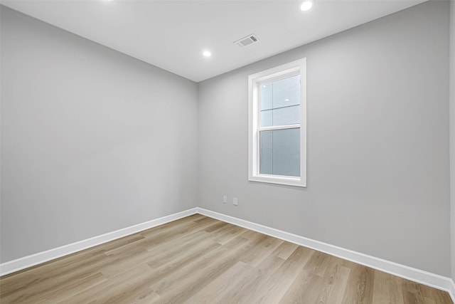 1325 Main St Unit 1103, Katy, TX 77494 - spare room with light wood finished floors, baseboards, and recessed lighting