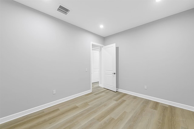 1325 Main St Unit 1103, Katy, TX 77494 - unfurnished room featuring light wood-style flooring, baseboards, and recessed lighting