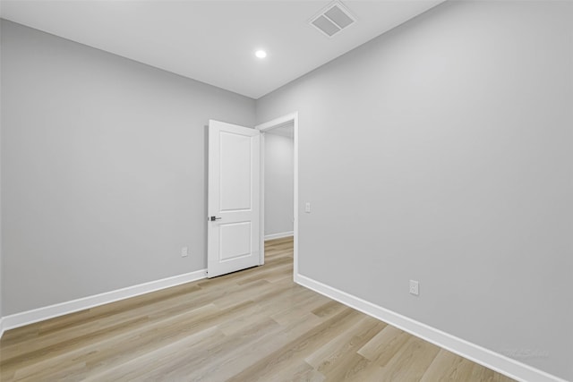 1325 Main St Unit 1103, Katy, TX 77494 - empty room featuring light wood finished floors, baseboards, and recessed lighting