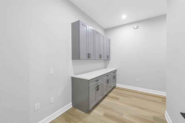 1325 Main St Unit 1103, Katy, TX 77494 - washroom featuring light wood finished floors, baseboards, and recessed lighting