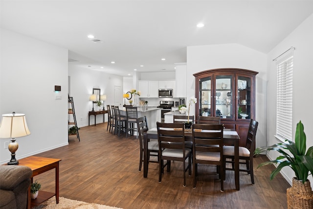 3313 Cold Swan Ct, Conroe, TX 77301 - dining area with dark wood-style floors, recessed lighting, and baseboards