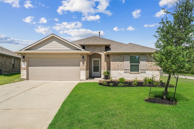 3313 Cold Swan Ct, Conroe, TX 77301 - view of front of house with a front yard, concrete driveway, a garage, a shingled roof, and brick siding