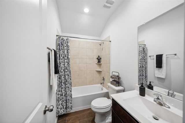 3313 Cold Swan Ct, Conroe, TX 77301 - bathroom featuring vanity, wood finished floors, toilet, shower / tub combo, and vaulted ceiling