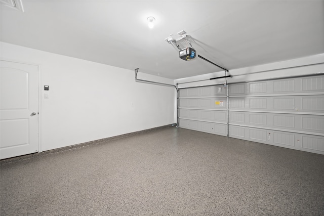 3313 Cold Swan Ct, Conroe, TX 77301 - garage with a garage door opener and baseboards