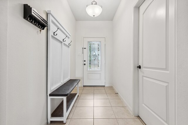20423 Barrel Run Dr, Hockley, TX 77447 - mudroom with light tile patterned flooring and baseboards