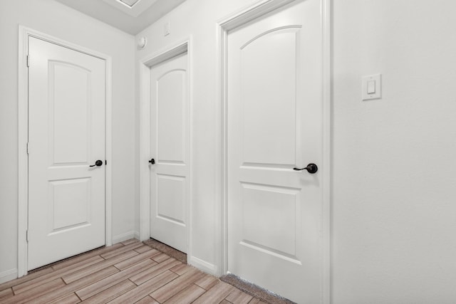 20423 Barrel Run Dr, Hockley, TX 77447 - hallway featuring light wood finished floors and baseboards