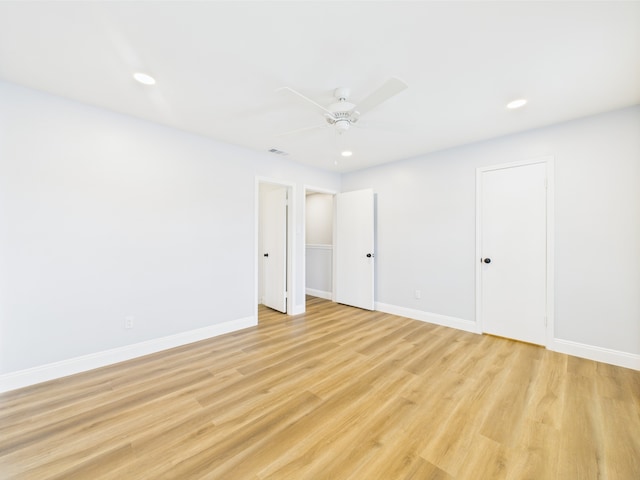 10380 Briar Forest Dr Unit 32/6, Houston, TX 77042 - spare room featuring ceiling fan, light wood-type flooring, baseboards, and recessed lighting