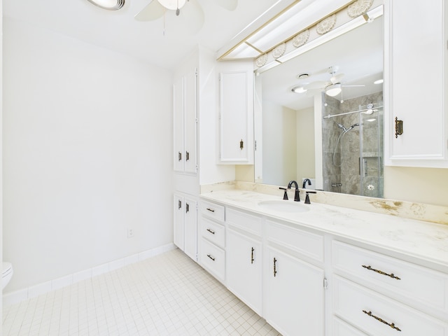 7608 Del Monte Dr, Houston, TX 77063 - full bath featuring a ceiling fan, vanity, a shower stall, and tile patterned flooring