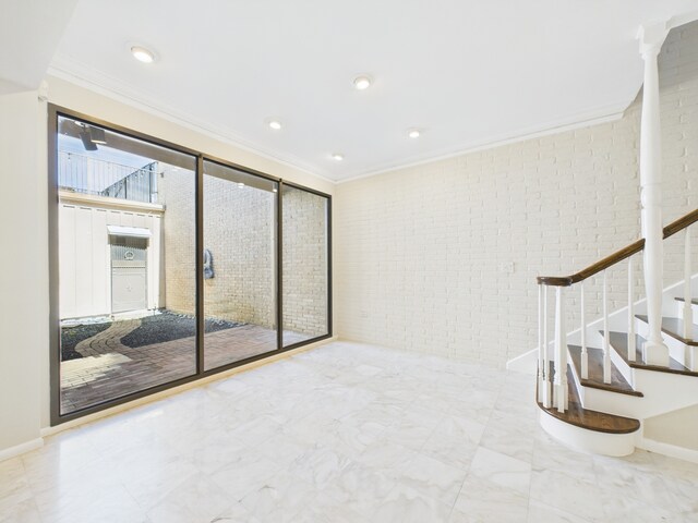 7608 Del Monte Dr, Houston, TX 77063 - spare room with crown molding, stairway, marble finish floors, and recessed lighting